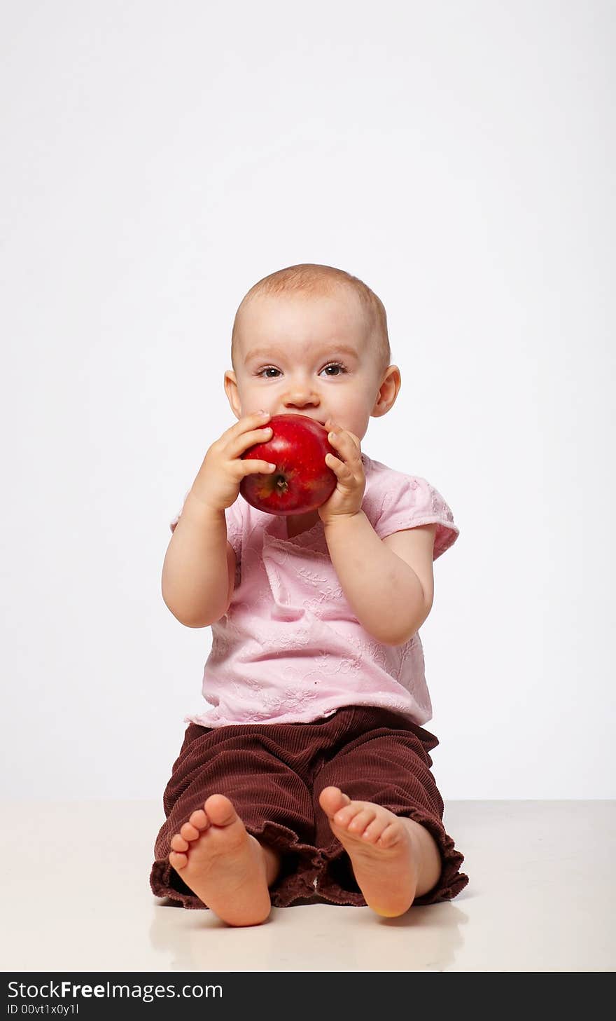 Portrait of baby with red apple. Portrait of baby with red apple