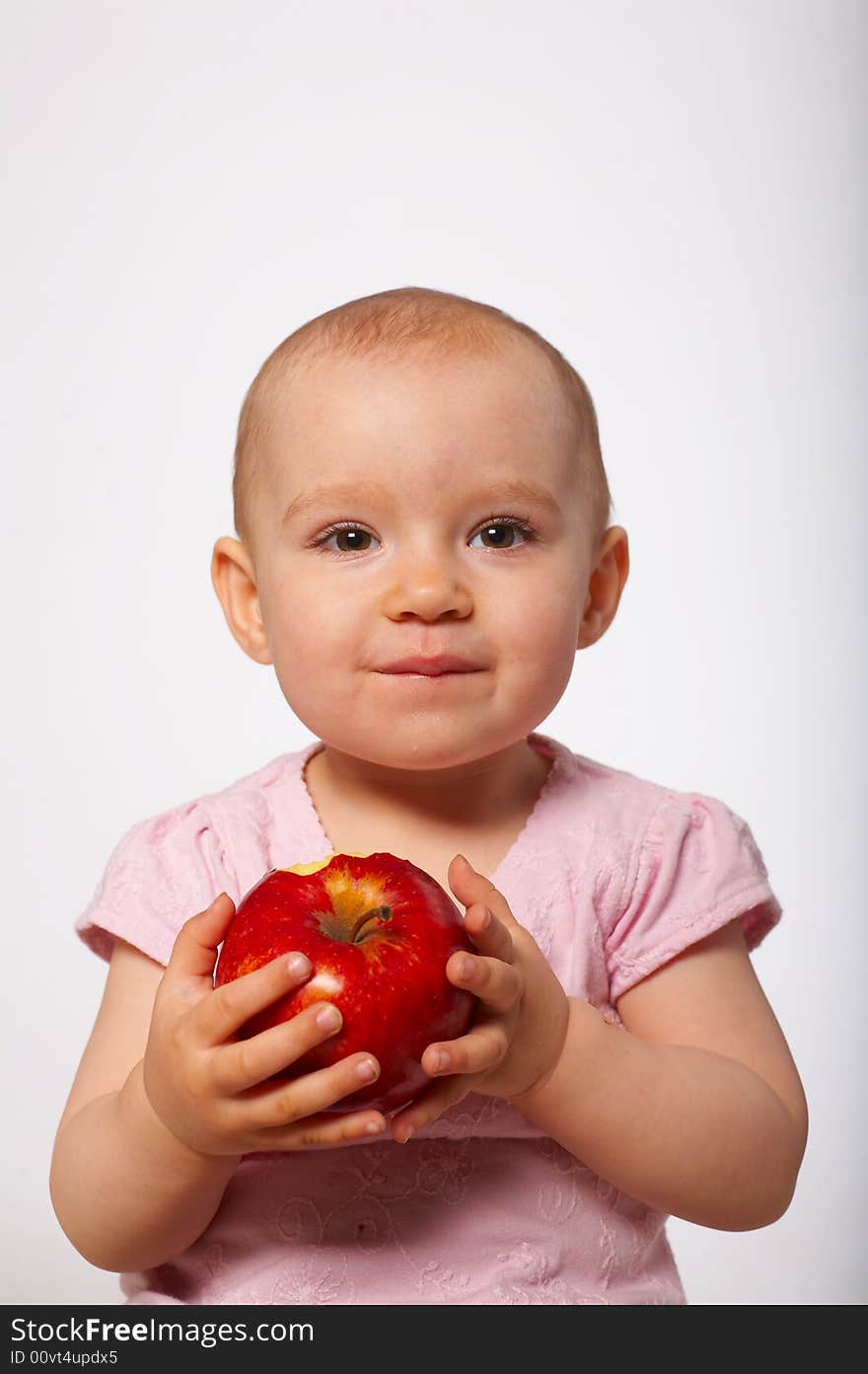 Portrait of baby with red apple. Portrait of baby with red apple