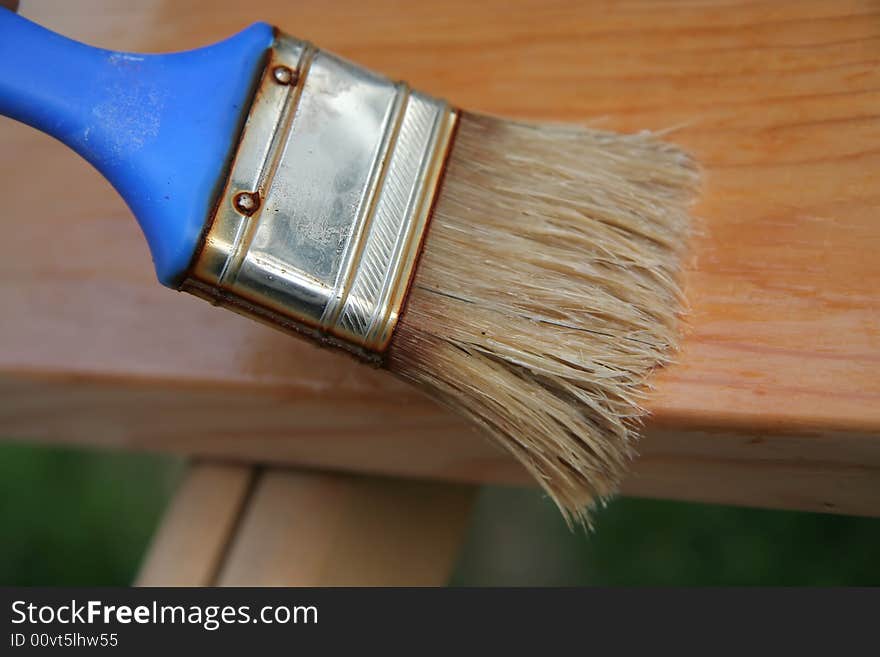 Wooden board with brush