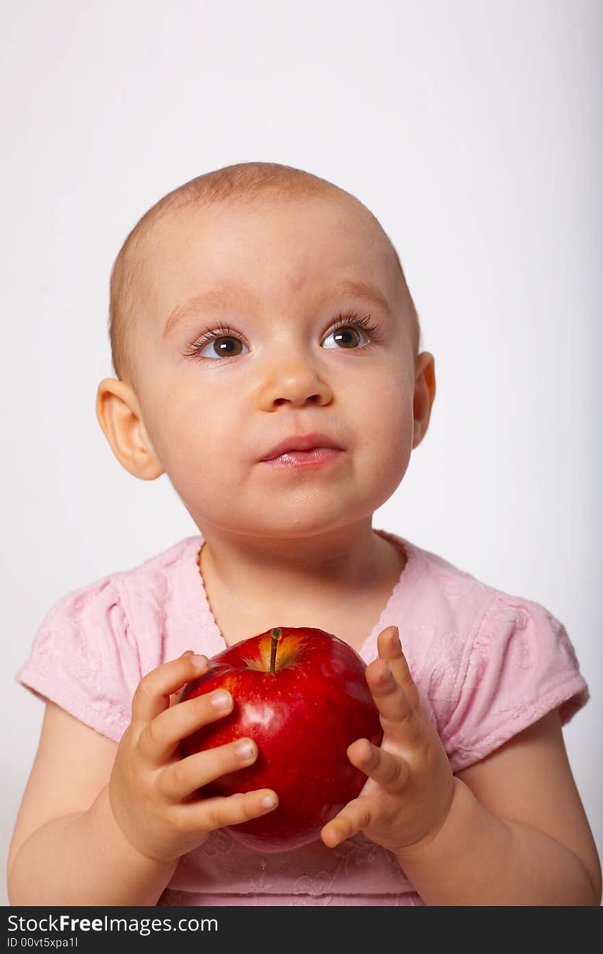 Portrait of baby with red apple. Portrait of baby with red apple