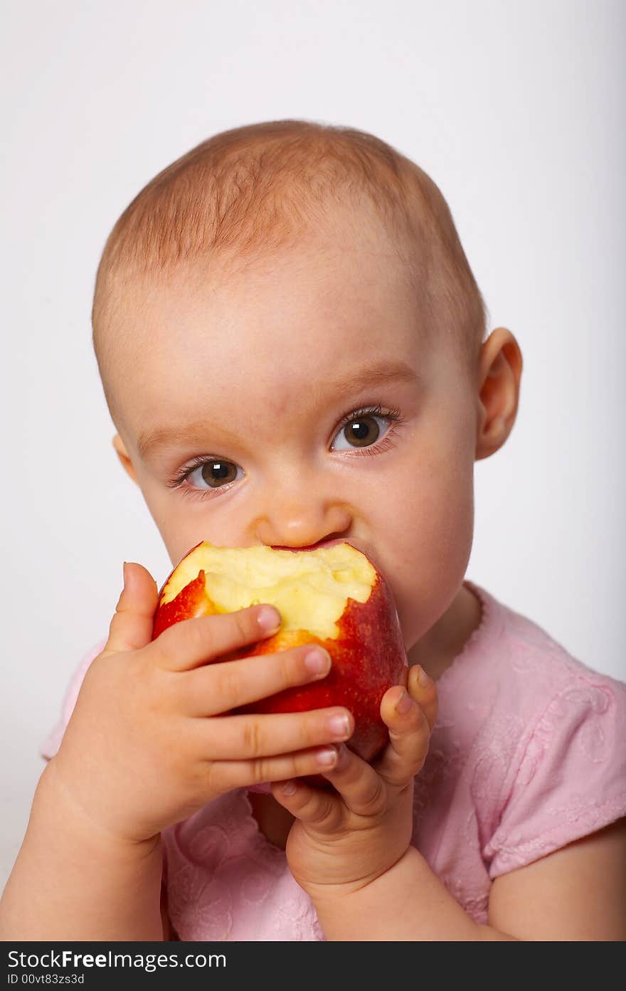 Portrait of baby with red apple. Portrait of baby with red apple