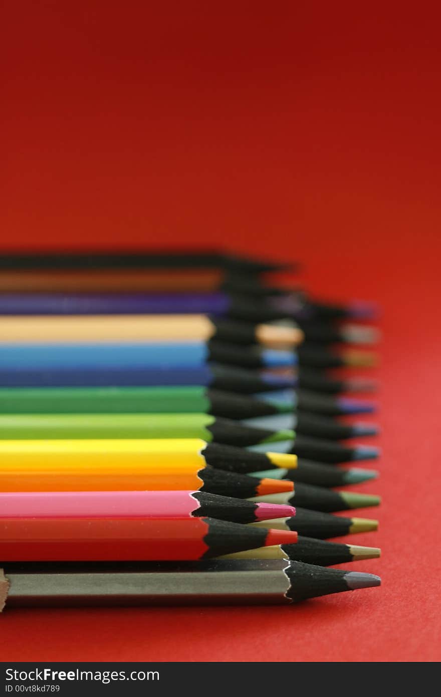 A part of pencils with a simple green background. A part of pencils with a simple green background