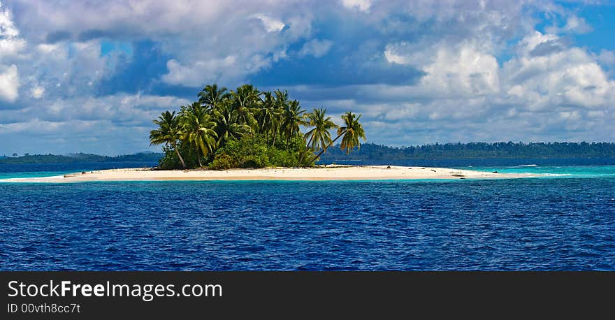 Paradisiac little island on mentawai, indonesia.