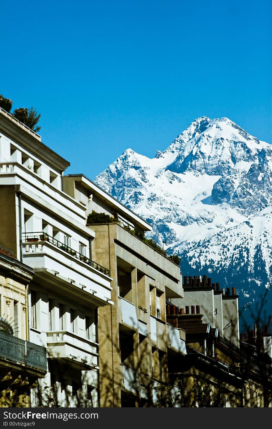 Alps peaks and rooftops