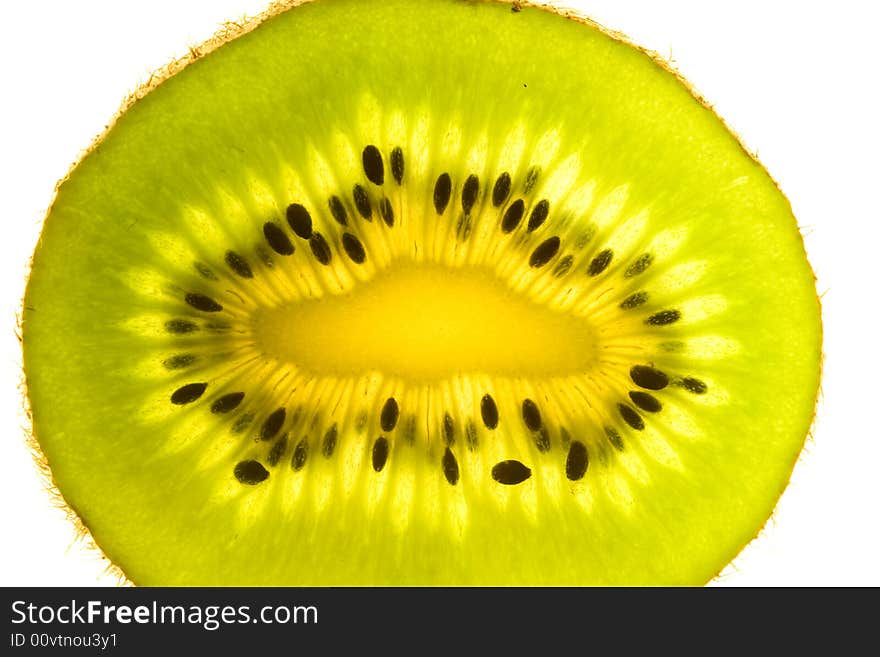 Sliced kiwi close up. Isolated on a white background. Sliced kiwi close up. Isolated on a white background.