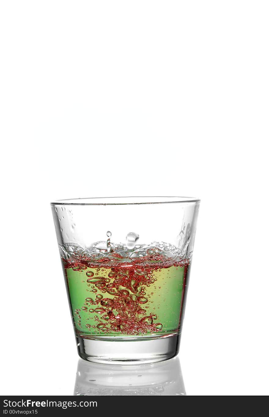 Drink splash at the top of a glass