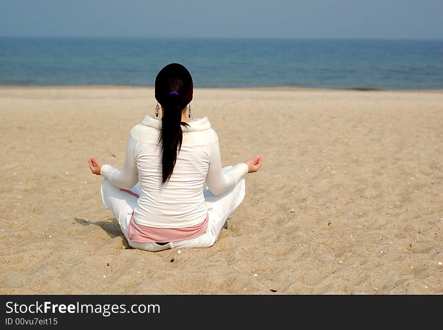 Attractive brunette woman on the beach. Attractive brunette woman on the beach