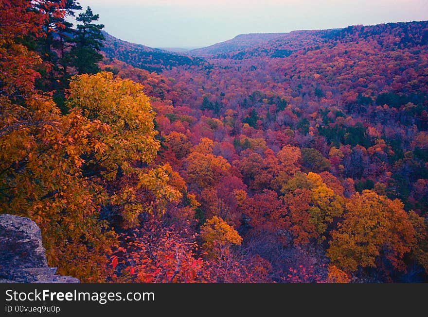 Looking down an autumn valley from the rim of one bluff. Looking down an autumn valley from the rim of one bluff