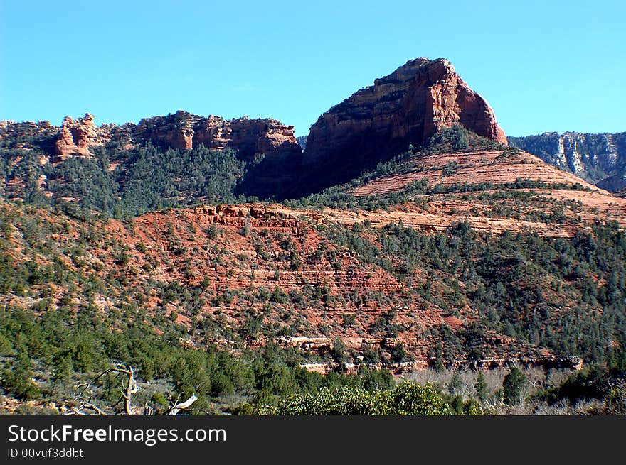 Photograph of the beautiful landscape in Sedona, Arizona. Visible sedimentary layers of rock.