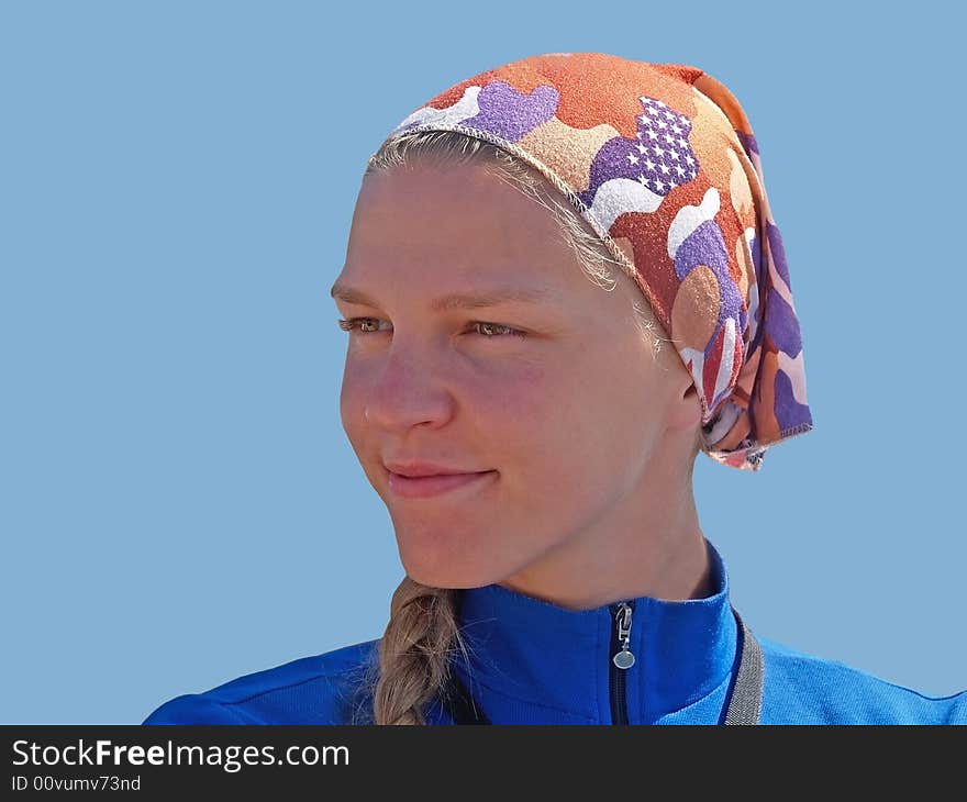 Portrait of happy country girl against the blue sky. Portrait of happy country girl against the blue sky