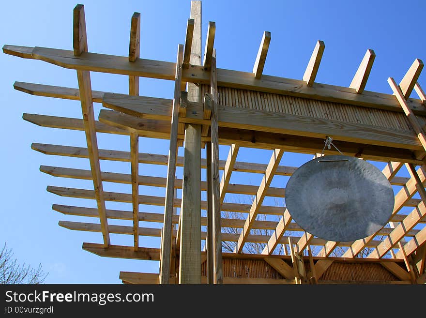 Complex traditional pergola with gong and bamboo