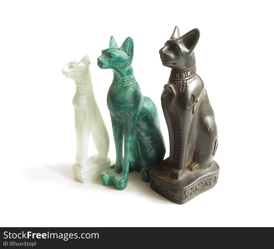 Stone Egyptian cats on a white background