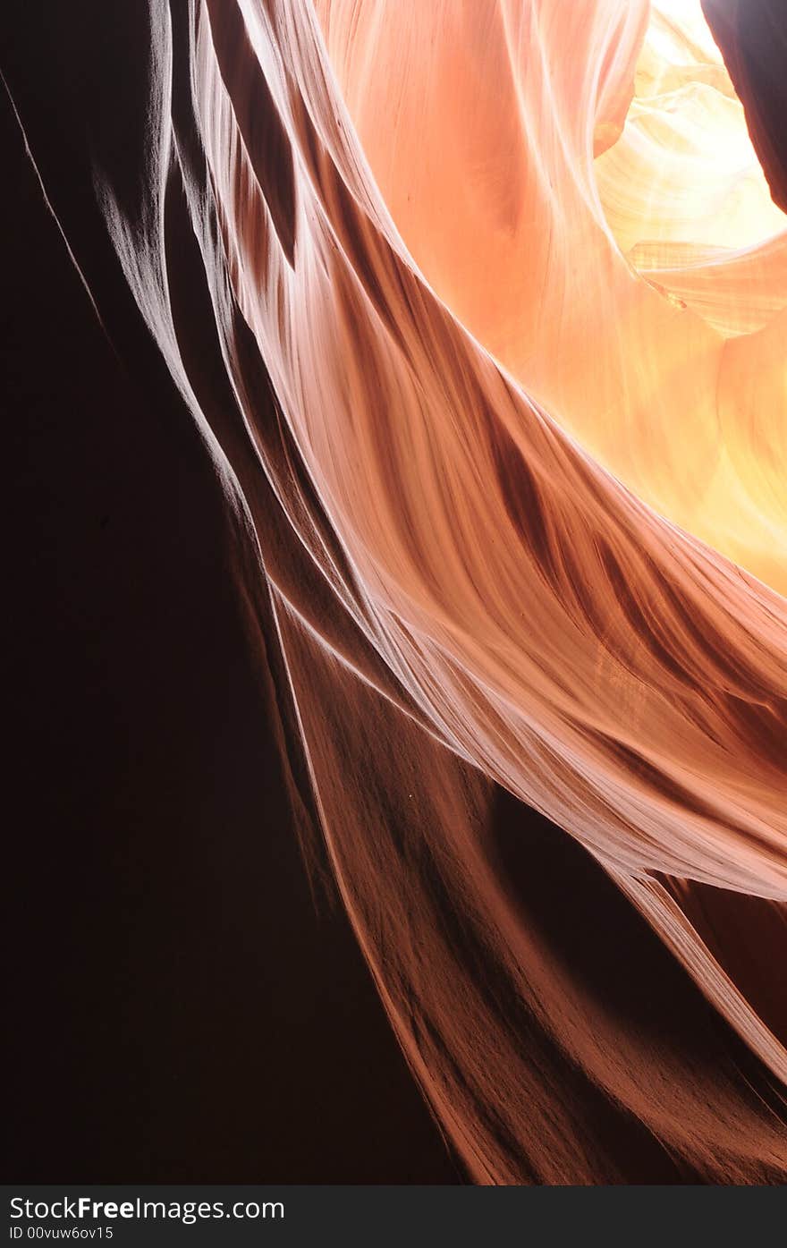 A ray of sunlight cast into Antelope Canyon, Page, Arizona