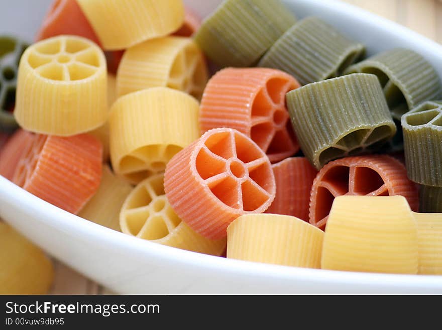 Beautiful table-ware with pasta tricolore