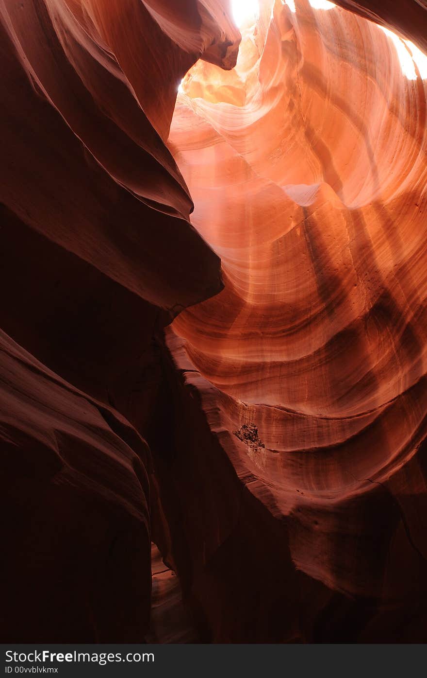 A ray of sunlight cast into Antelope Canyon, Page, Arizona