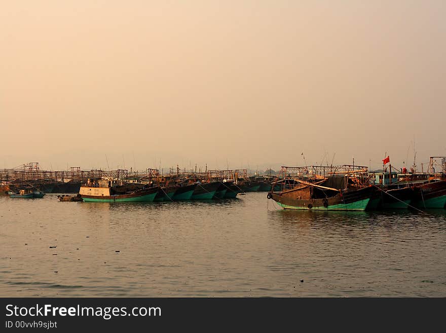 The fishing boat anchors in the wharf