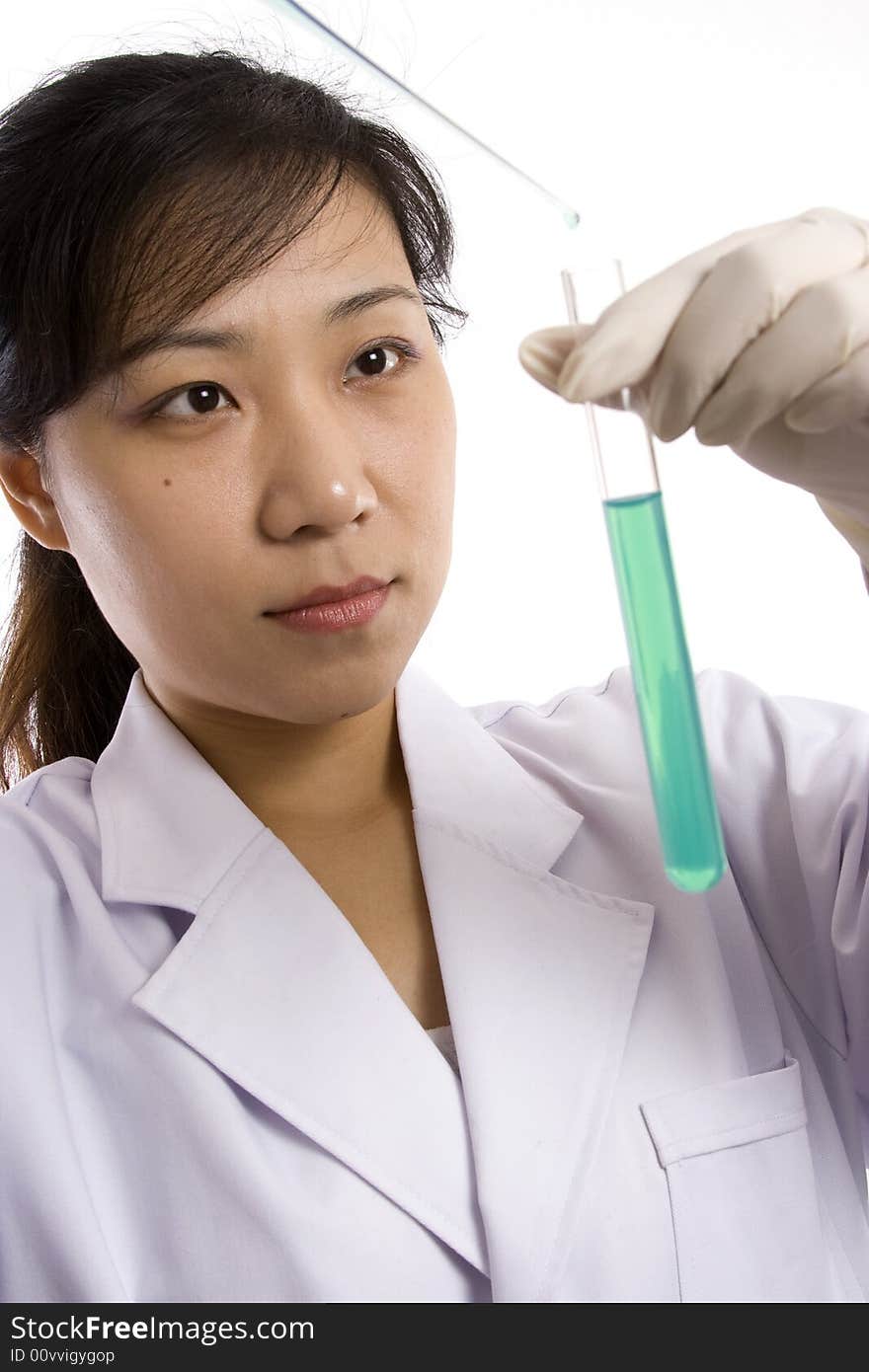 Female scientist with test tube in white background.