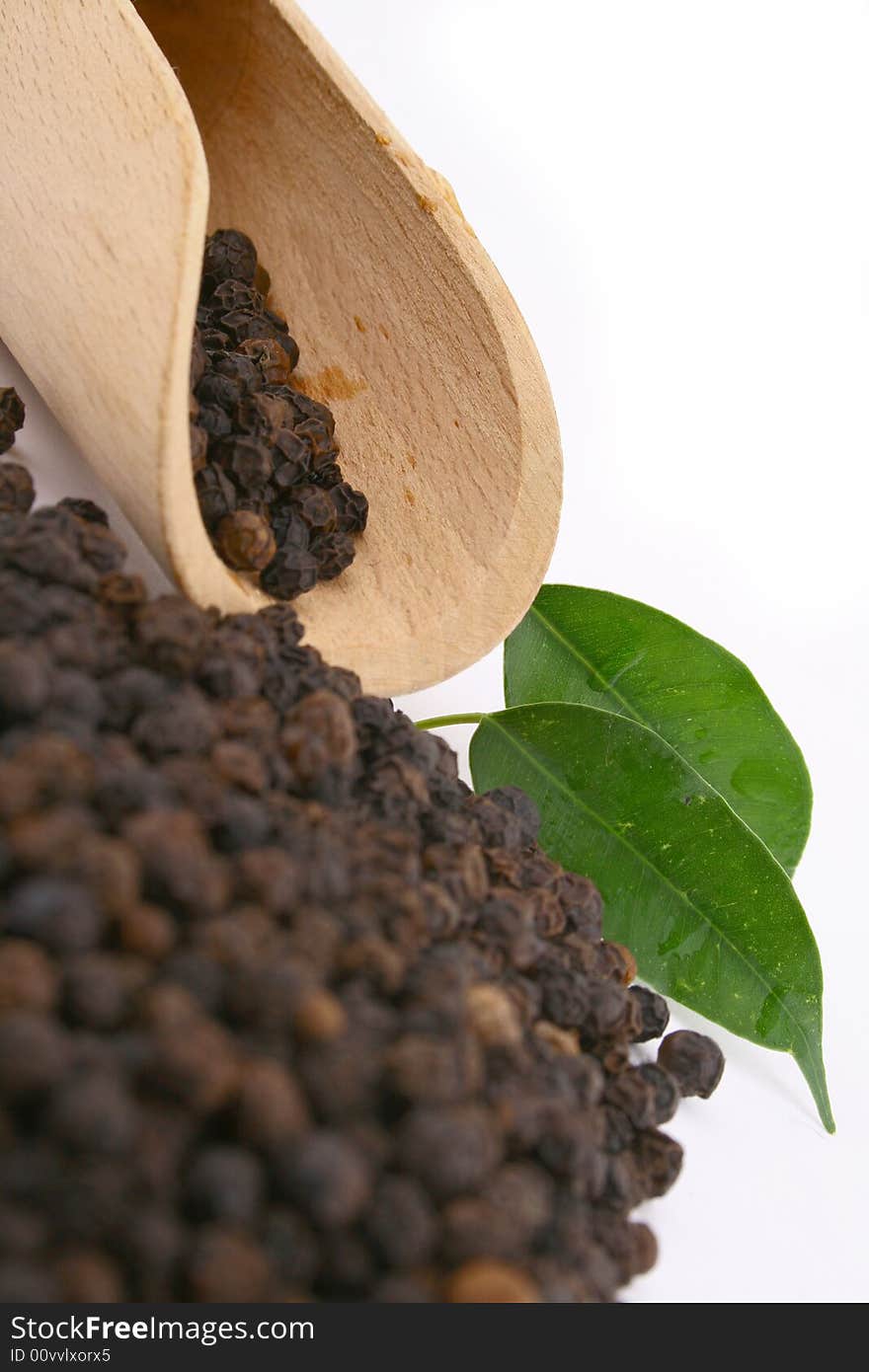 Peppercorns in wooden