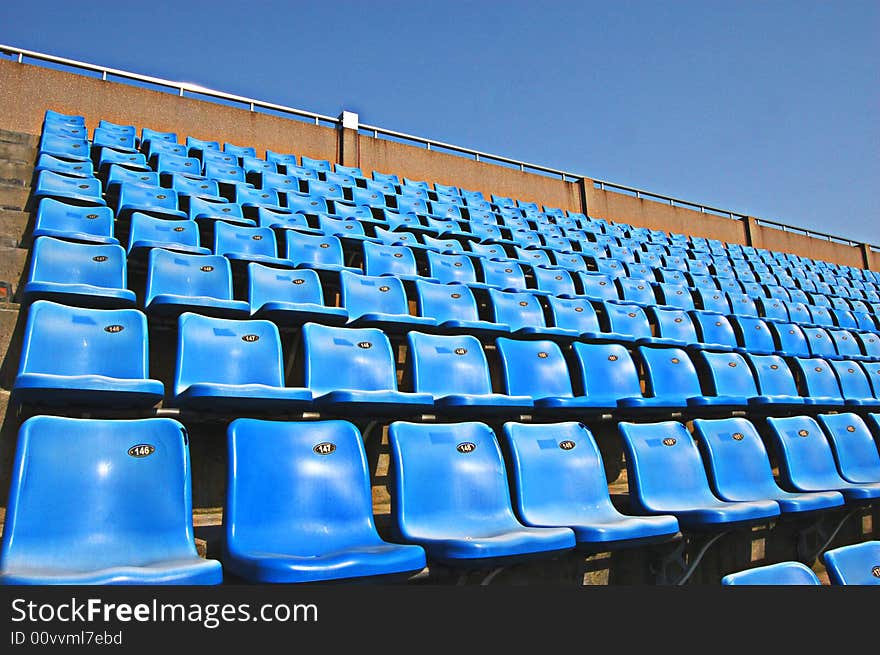 This is can hold over ten thousand person of spectator seats, the neat stool and the blue sky give you the very comfortable feeling