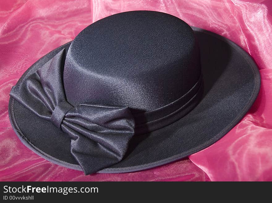 Dark blue ladies dress hat with ribbon