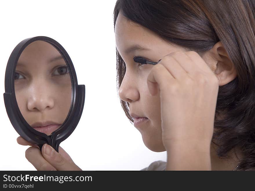 Teenagers applying makeup