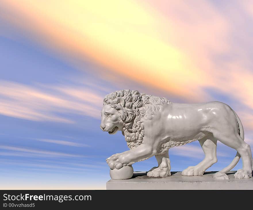 Sculpture of a white lion on a background of the blue sky