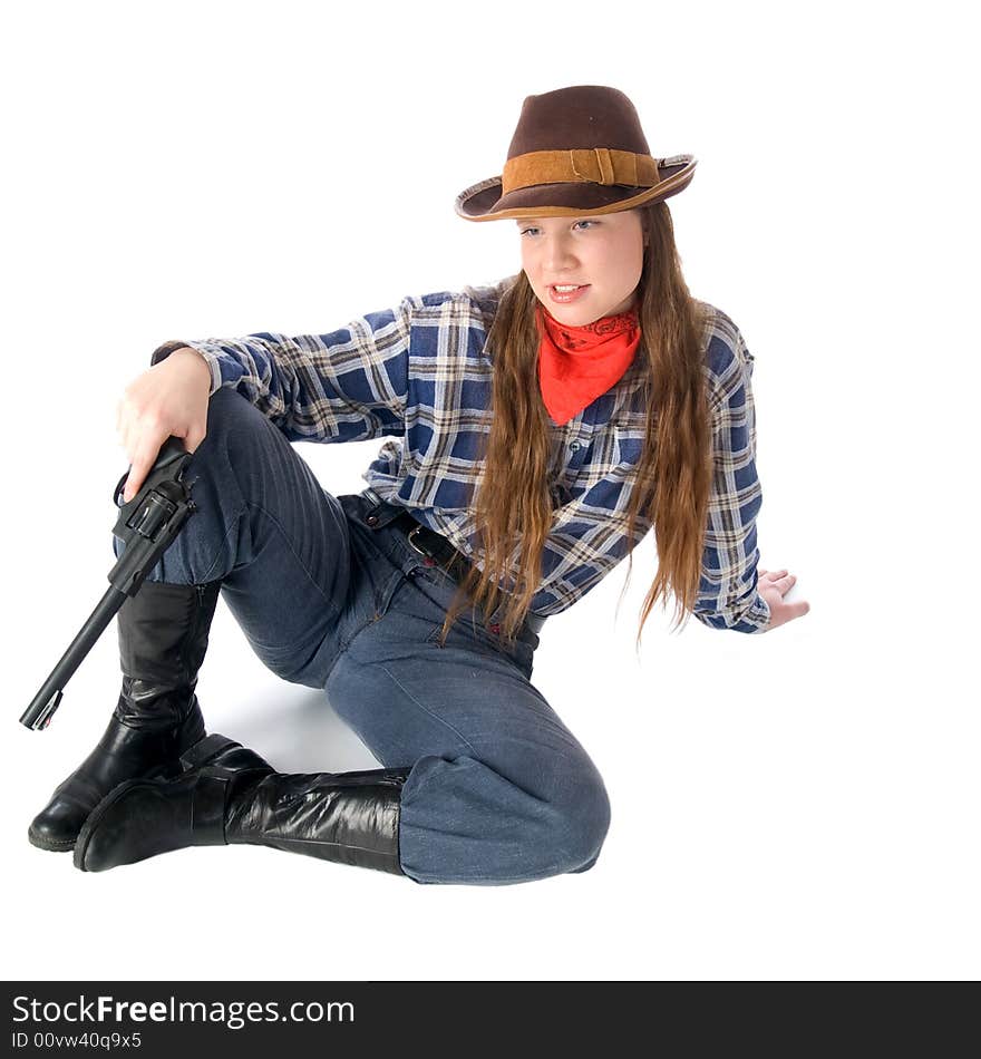 Cowgirl with gun sitting and glares down upon all with the utmost contempt (isolated on white)