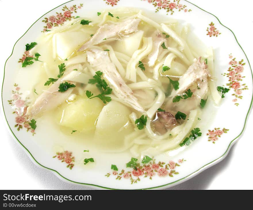 Hot chicken soup bouillon in white dish. Hot chicken soup bouillon in white dish