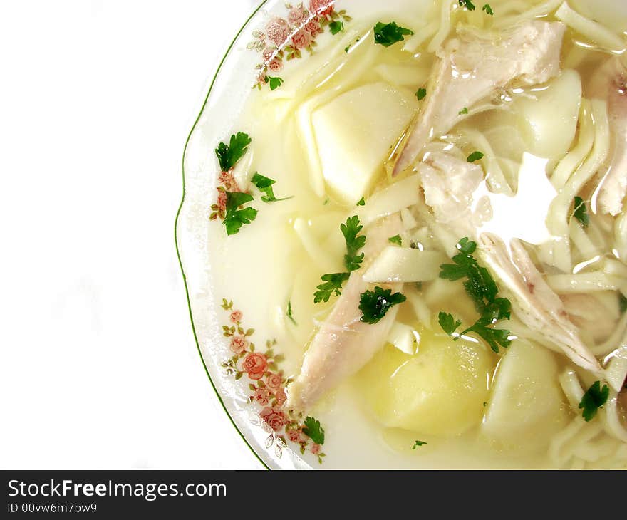 Hot chicken soup bouillon in white dish. Hot chicken soup bouillon in white dish