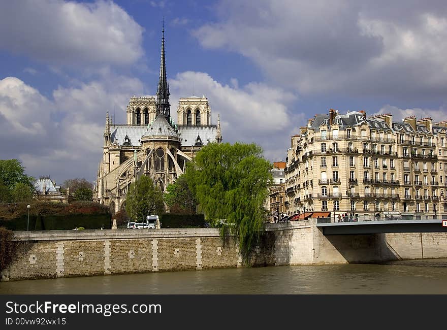 Notre Dame Cathedral on a sunny Spring day with the River Seine in the foreground. Notre Dame Cathedral on a sunny Spring day with the River Seine in the foreground.