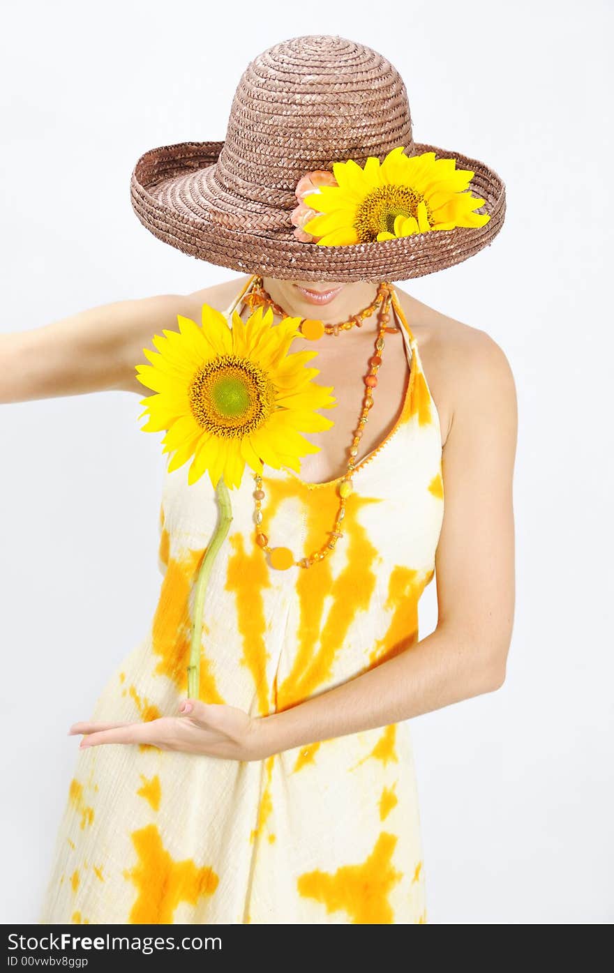 Girl holding sunflower