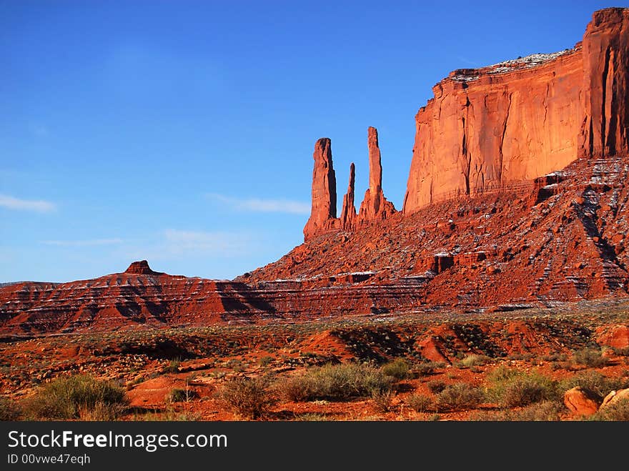 Three Sisters rock formation in Monument Valley