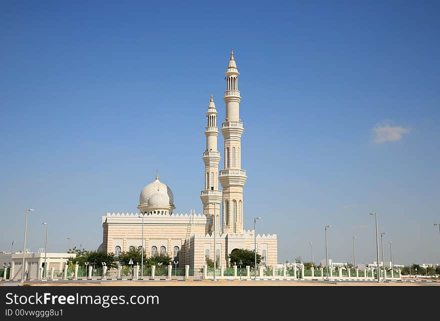 Modern Mosque building against Blue sky