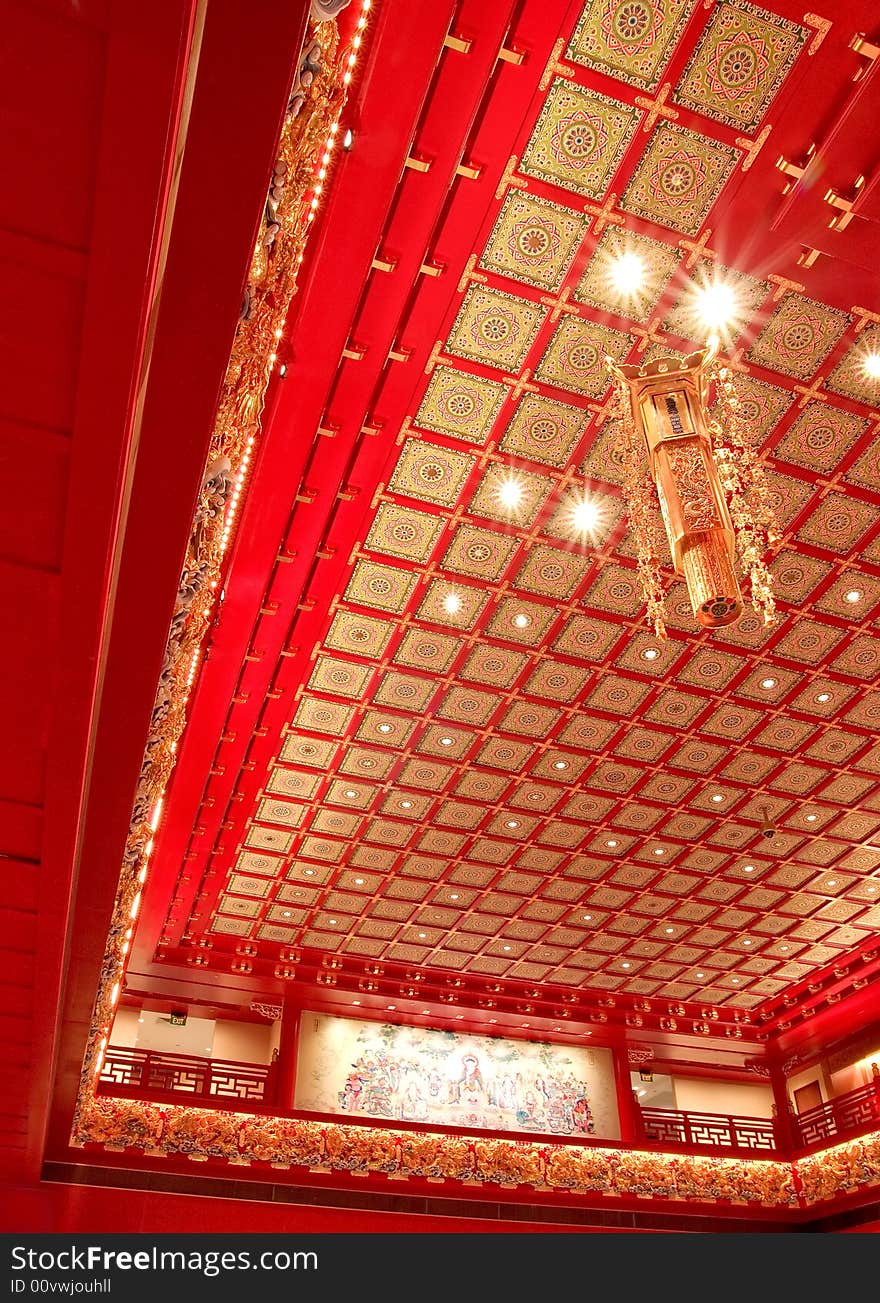 Indoor architecture of a chinese temple called the buddha tooth relic temple in singapore. Indoor architecture of a chinese temple called the buddha tooth relic temple in singapore.