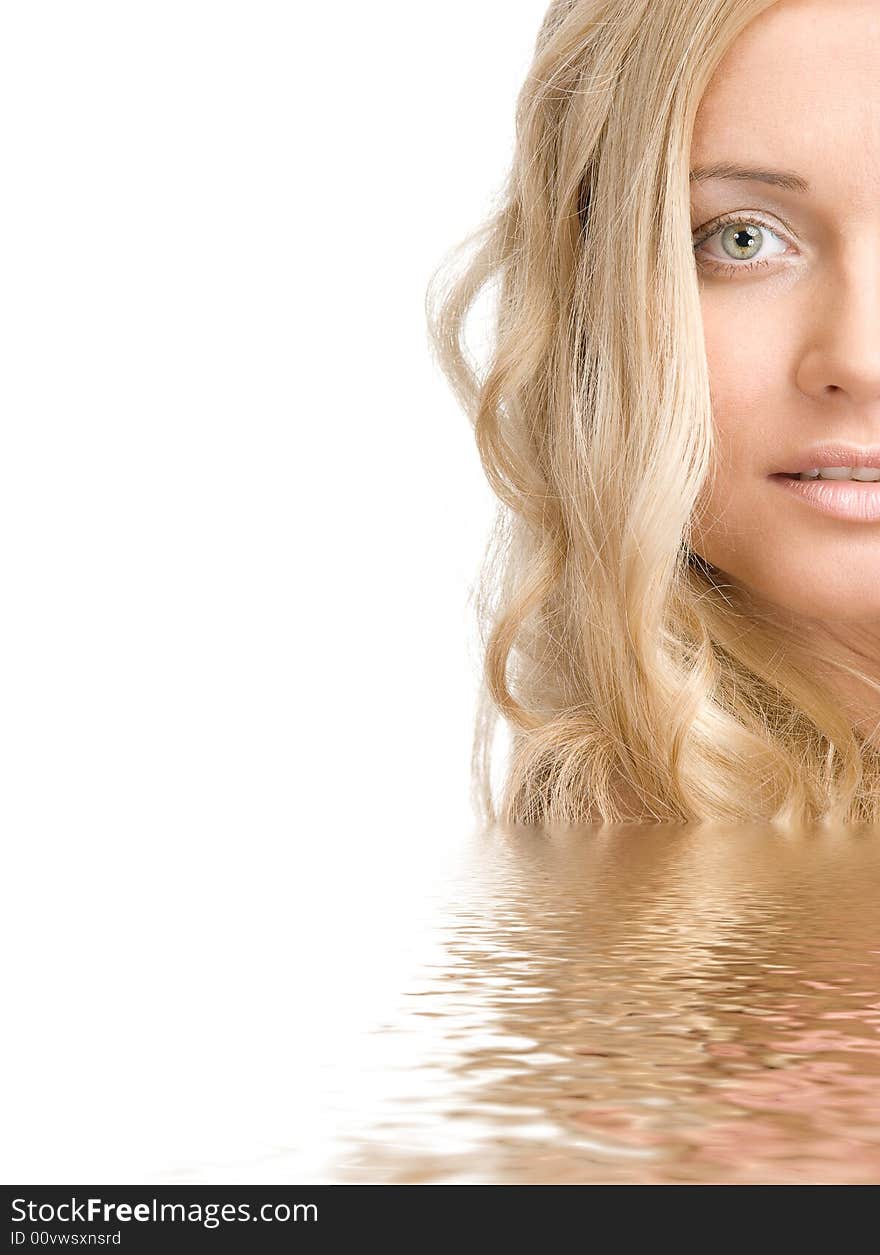 Portrait of a beautiful blond lady in water on a white background. Portrait of a beautiful blond lady in water on a white background