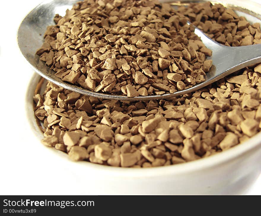 Instant coffee granules closeup macro