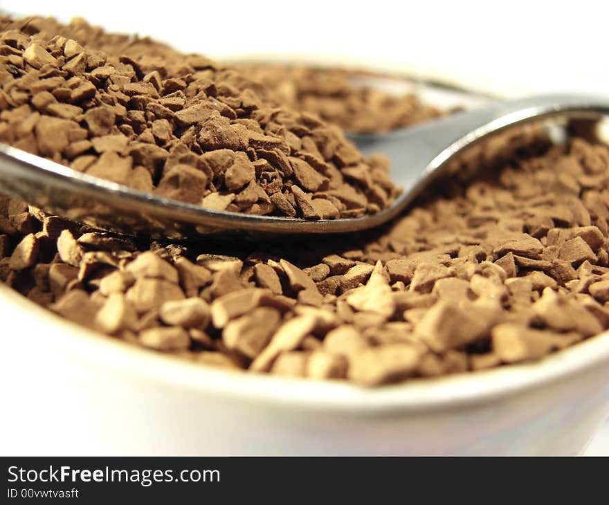 Instant coffee metal spoon closeup