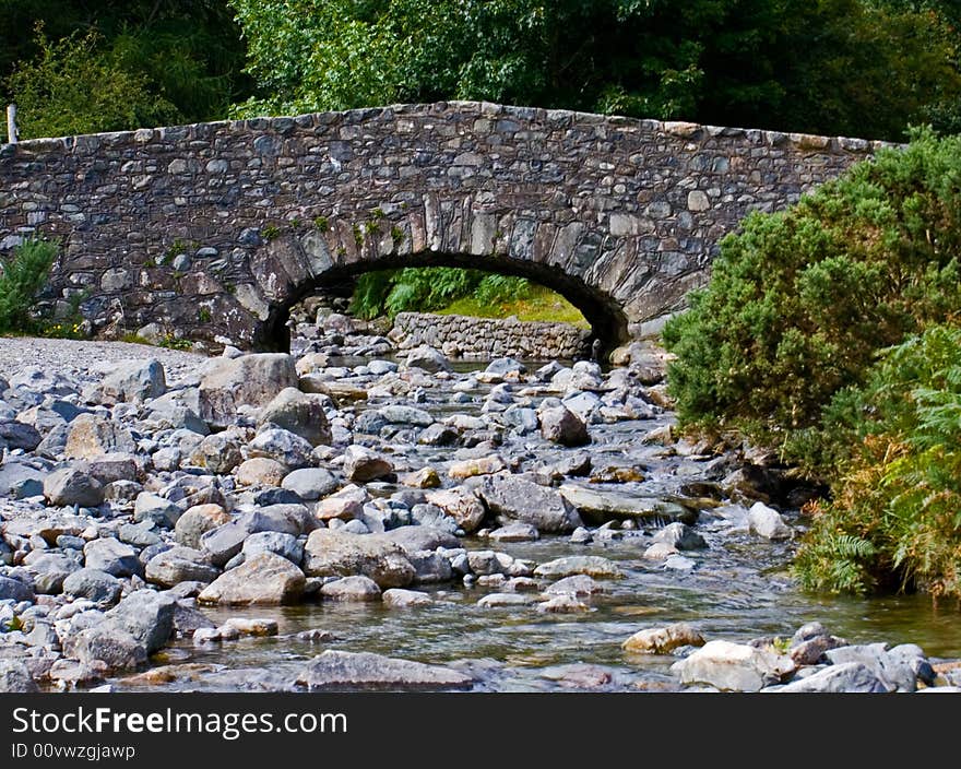 Bridge on rocky stream