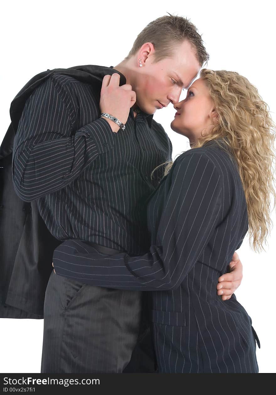 Young couple in black dress on white background