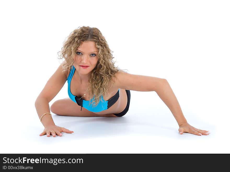 Girl practicing fitness  on  white  background