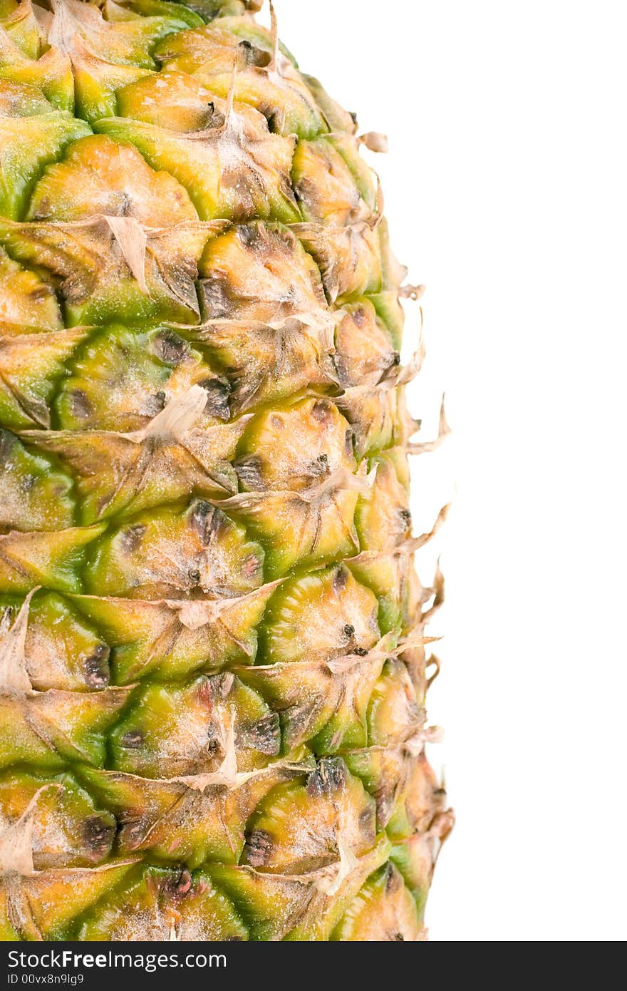 A vertical closeup of the texture of a fresh pineapple. A vertical closeup of the texture of a fresh pineapple