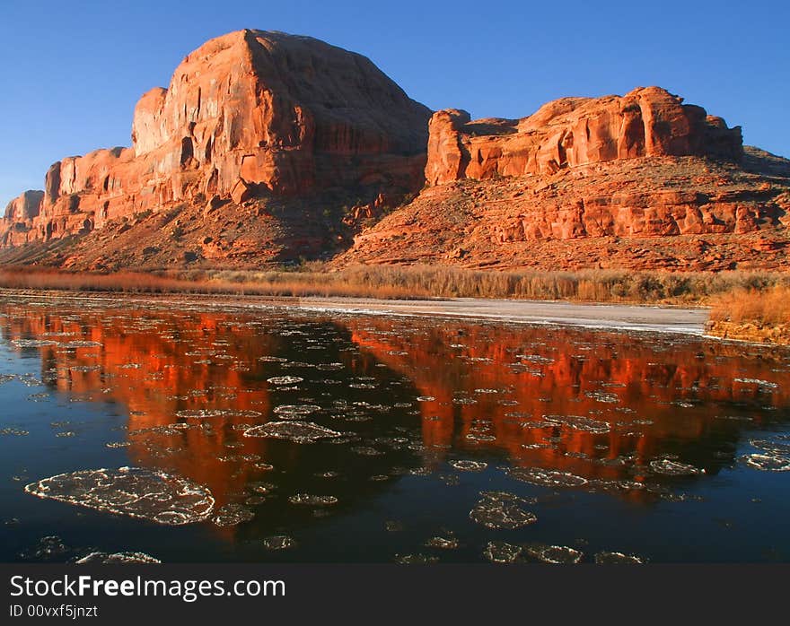 Red rock reflections on the Colorado River with Blue sky�s. Red rock reflections on the Colorado River with Blue sky�s