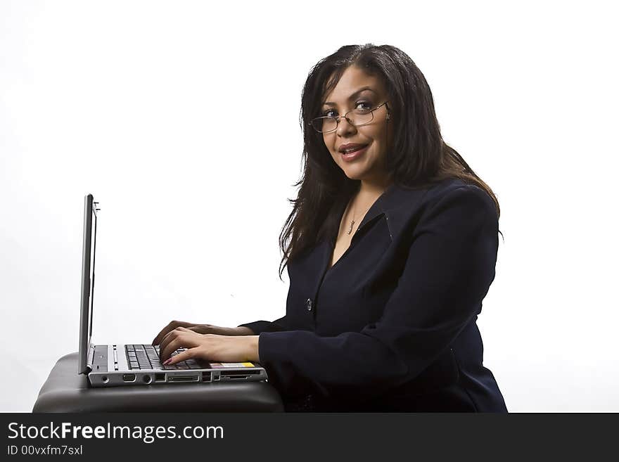 Pretty hispanic woman who is posing for the camera. Pretty hispanic woman who is posing for the camera