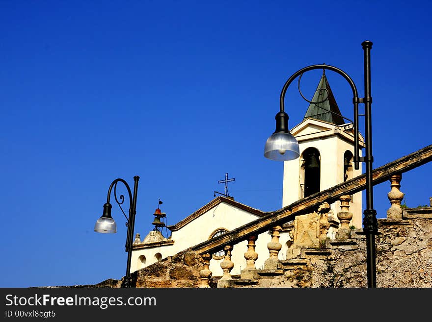 Church bell tower on blue sky