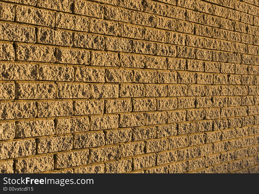 The patterns created by the bricks in a facebrick wall. The patterns created by the bricks in a facebrick wall