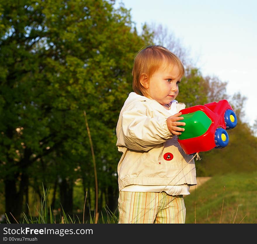 Nice girl plays whith bright toy