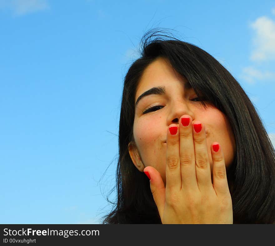 Woman Blowing A Kiss