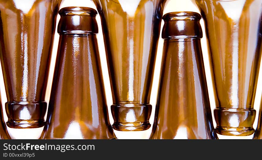 Close-up of beer bottles isolated on white background