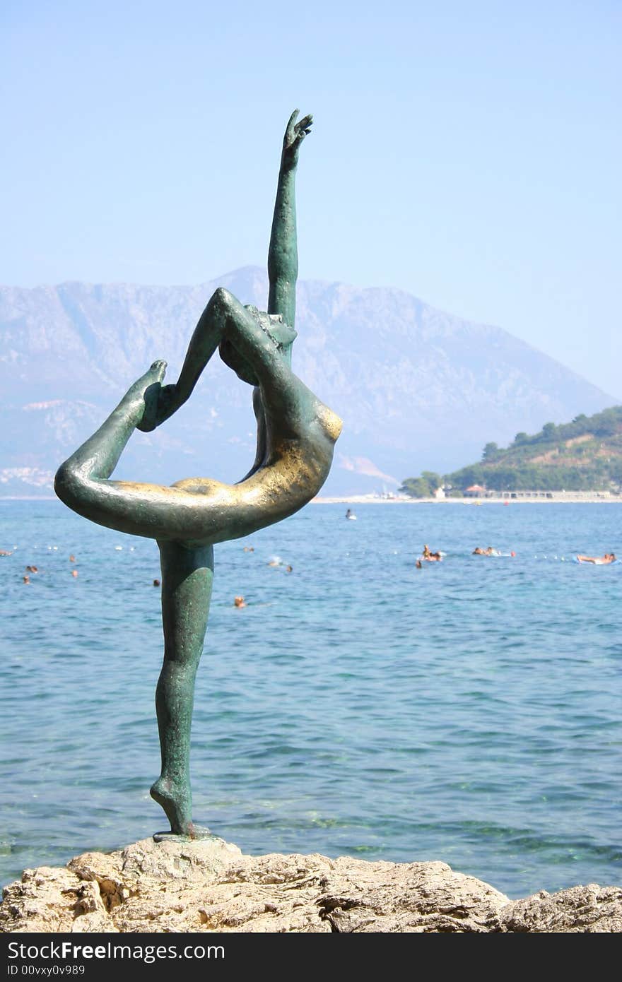 A bronze statue of a dancer in Budva, Montenegro. A bronze statue of a dancer in Budva, Montenegro.