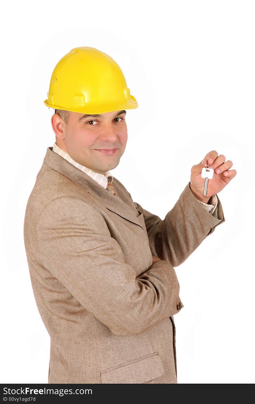 A businessman with keys on white background